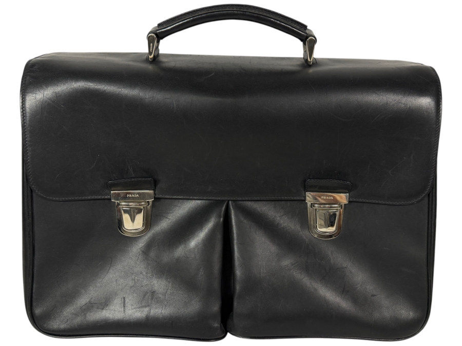 Just Added - Vintage Prada Black Smooth Calfskin Leather Flap-Over Briefcase Featuring Dual Silver-Tone Tuck Lock Closures And Single Top Handle 17.5'W X 14'H