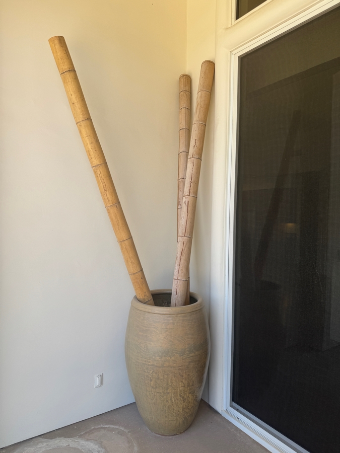 Large Tapered Tempayan Terracotta Urn Floor Vase In Weathered Ochre Patina Featuring Three Tall Oversized Natural Bamboo Decorative Poles Vase: 24'W X 43'H Bamboo: 120'H [Photo 4]
