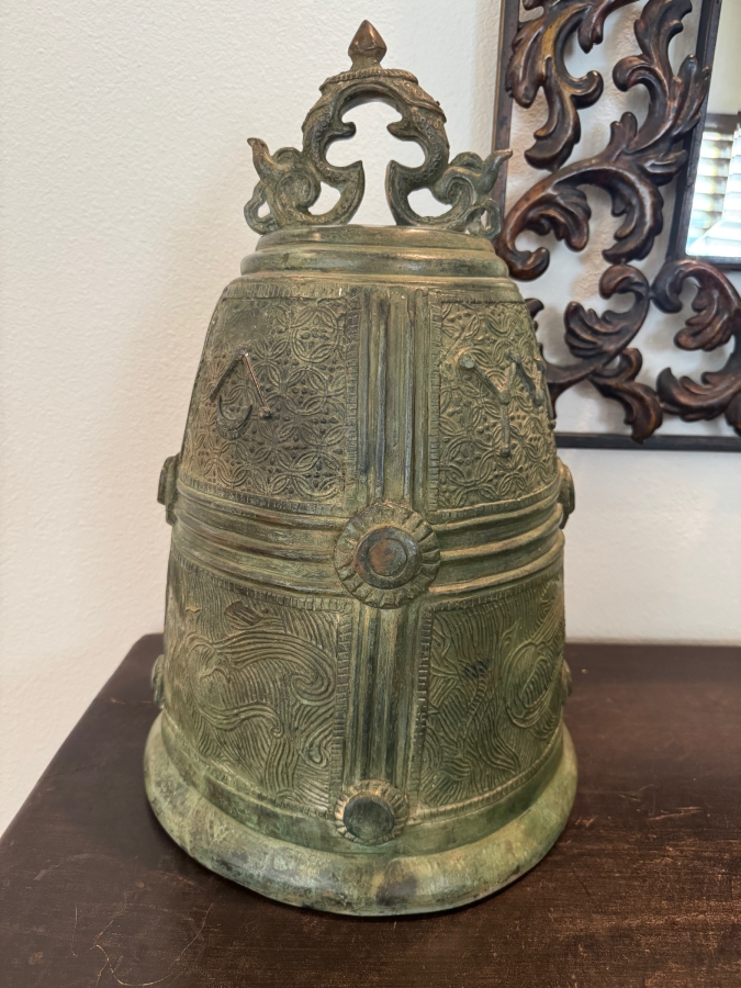 Archaic Style Chinese Bronze Temple Bell Featuring Ornate Relief Wave And Lattice Motifs With A Dragon Handle and Weathered Verdigris Patina Finish 19'H