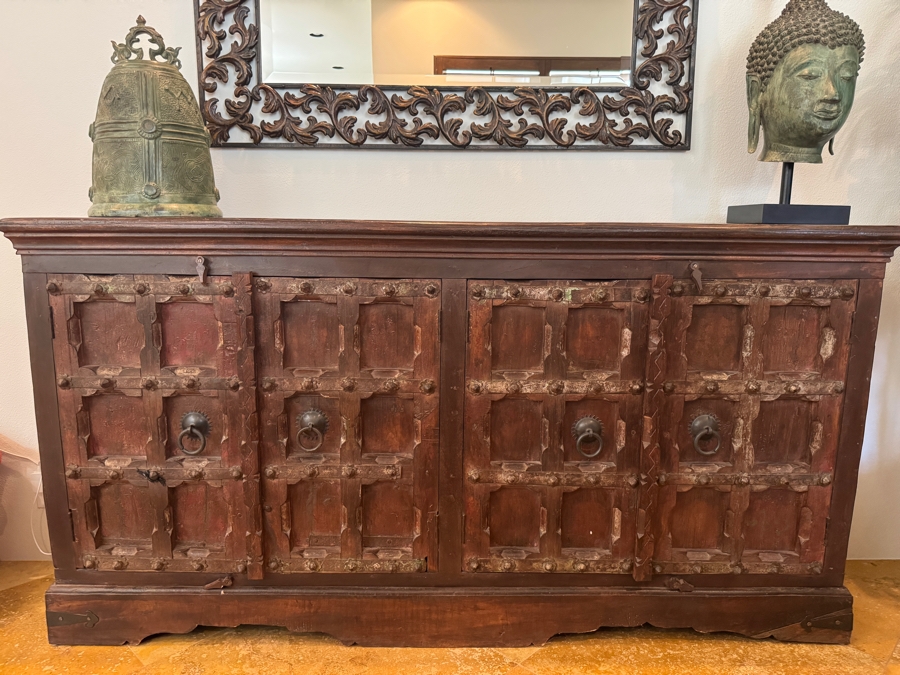 Vintage Indian Wooden Sideboard Crafted From Reclaimed Antique Doors Featuring Hand-Carved Sunken Panels Decorative Iron Studs And Hand-Forged Ring Pulls In A Distressed Finish 77'W X 17'D X40'H