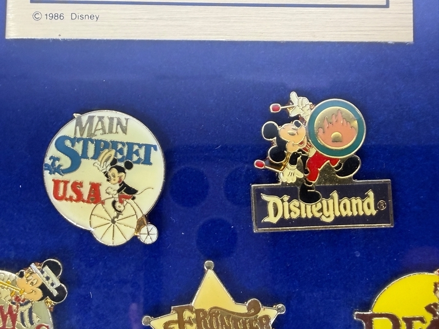 Vintage Disneyland 1986 Framed Commemorative 8 Disneyland Trading Pin Set Representing The Seven Unique Lands Of The Park In Wood Frame 7'W X 9'H [Photo 3]