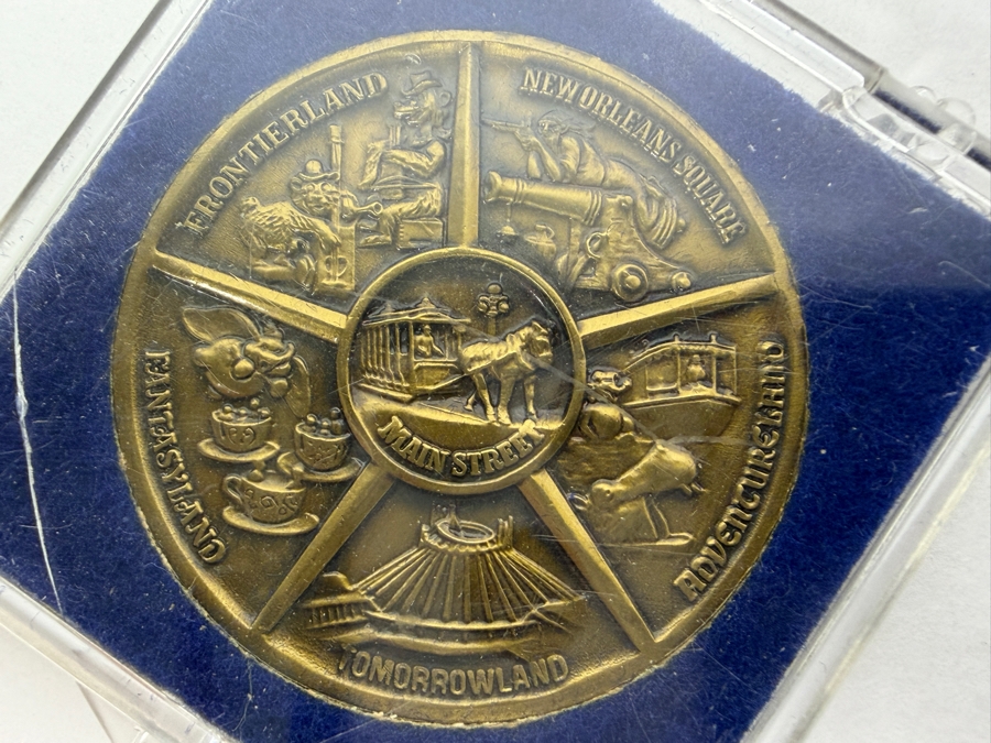 (6) Vintage Walt Disney Productions Bronze Disneyland Commemorative Medallion Featuring Sleeping Beauty Castle And Five Themed Lands In Plastic Display Cases [Photo 5]