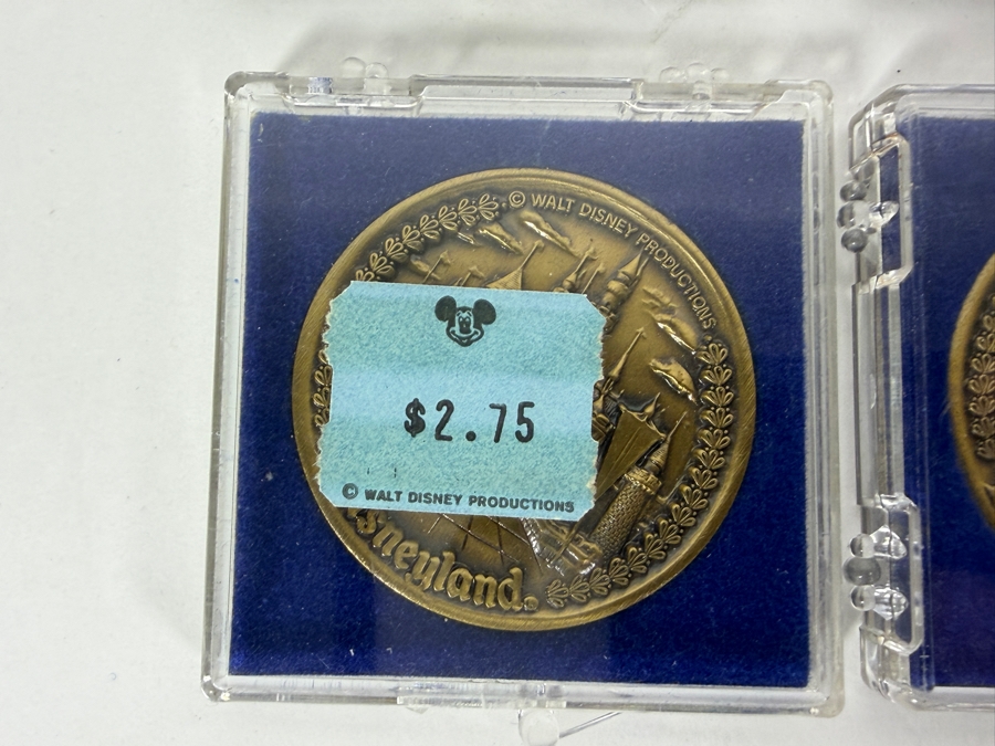 (6) Vintage Walt Disney Productions Bronze Disneyland Commemorative Medallion Featuring Sleeping Beauty Castle And Five Themed Lands In Plastic Display Cases [Photo 4]