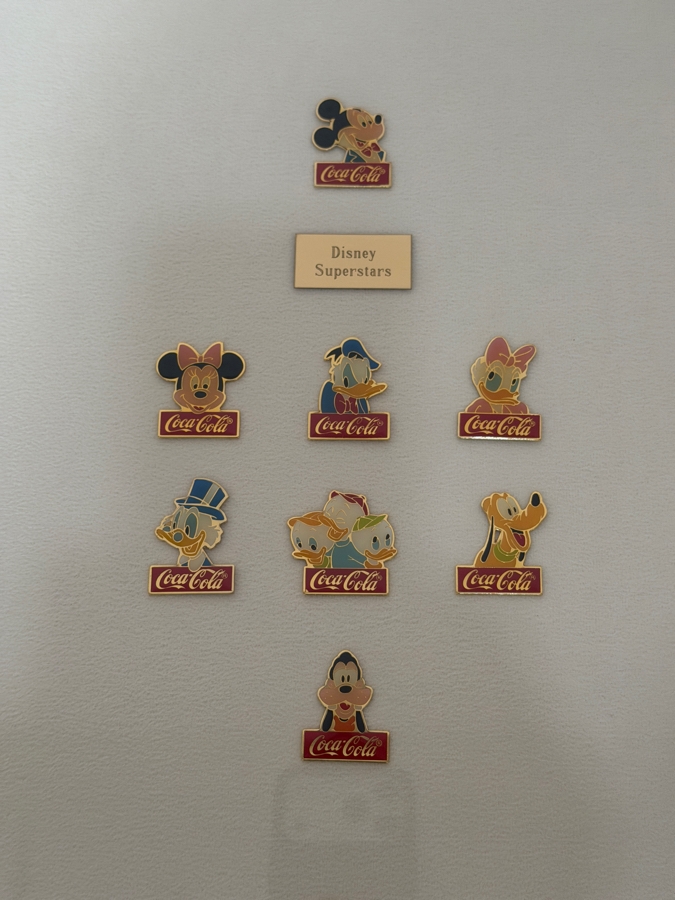 Just Added - Framed Collection Of 60 Vintage 1985 Coca-Cola And Walt Disney World 15th Anniversary Commemorative Pins 21 X 49 [Photo 4]