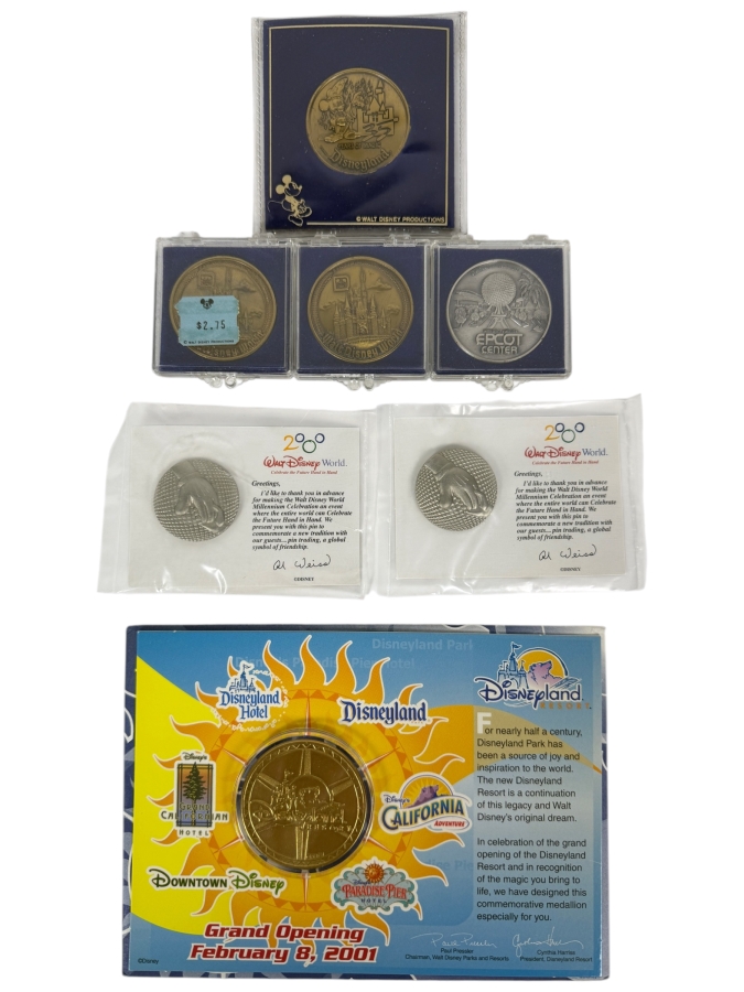 Just Added - (1) Disneyland California 35 Years Of Magic 42mm Bronze Medallion, (2) Walt Disney World Bronze Souvenir Medallions, (1) 1982 EPCOT Center Medallion, (2) WDW Millennium Pins & (1) Grand Opening Medallion Of The Disneyland Resort In CA