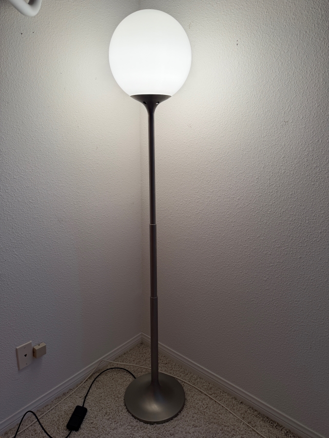 Mid-Century Modern Italian Space Age Artemide Polluce Model Designed By Anna Fasolls & Enzo Mari Floor Lamp Featuring White Globe Shade And Silver Stem 67'H