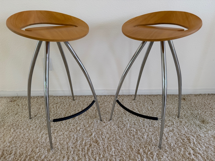 Pair Of Magis Lyra Bar Stools Designed By Design Group Italia With A Scooped Beech Wood Seat And Curved Chrome Legs 27' Seat Height