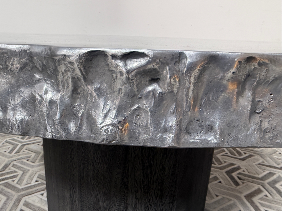 Bernhardt Interiors 'Cahill' Reclaimed Aluminum Round Pedestal Dining Table With An Irregular Live-Edge Profile And Cylindrical Suar Wood Base Retails $12,000 [Photo 8]