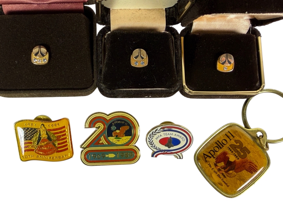 (3) Vintage 1/5 10k Gold Rockwell Employee Service Pins, 10th Year Anniversary of Columbia Space Shuttle Pin, 20 Year Anniversary Apollo 11 Pin, Apollo 11 25 Year Keychain and MFA Team Award Pin