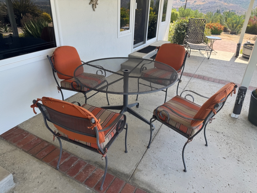 Just Added - Five Piece Wrought Iron Patio Set With Orange Cushions [Photo 2]