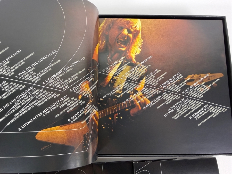 Judas Priest 'Metalogy' Limited Edition 5-Disc Box Set (4 CDs, 1 DVD, And 64-Page Retrospective Booklet) Featuring Black Faux-Leather Outer Slipcase Decorated With Triple-Row Pyramid Metal Stud Bound Edging [Photo 5]