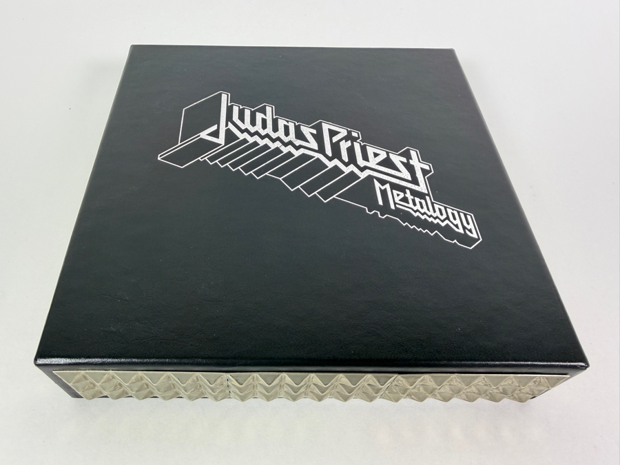 Judas Priest 'Metalogy' Limited Edition 5-Disc Box Set (4 CDs, 1 DVD, And 64-Page Retrospective Booklet) Featuring Black Faux-Leather Outer Slipcase Decorated With Triple-Row Pyramid Metal Stud Bound Edging [Photo 11]