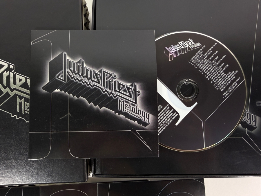 Judas Priest 'Metalogy' Limited Edition 5-Disc Box Set (4 CDs, 1 DVD, And 64-Page Retrospective Booklet) Featuring Black Faux-Leather Outer Slipcase Decorated With Triple-Row Pyramid Metal Stud Bound Edging [Photo 7]