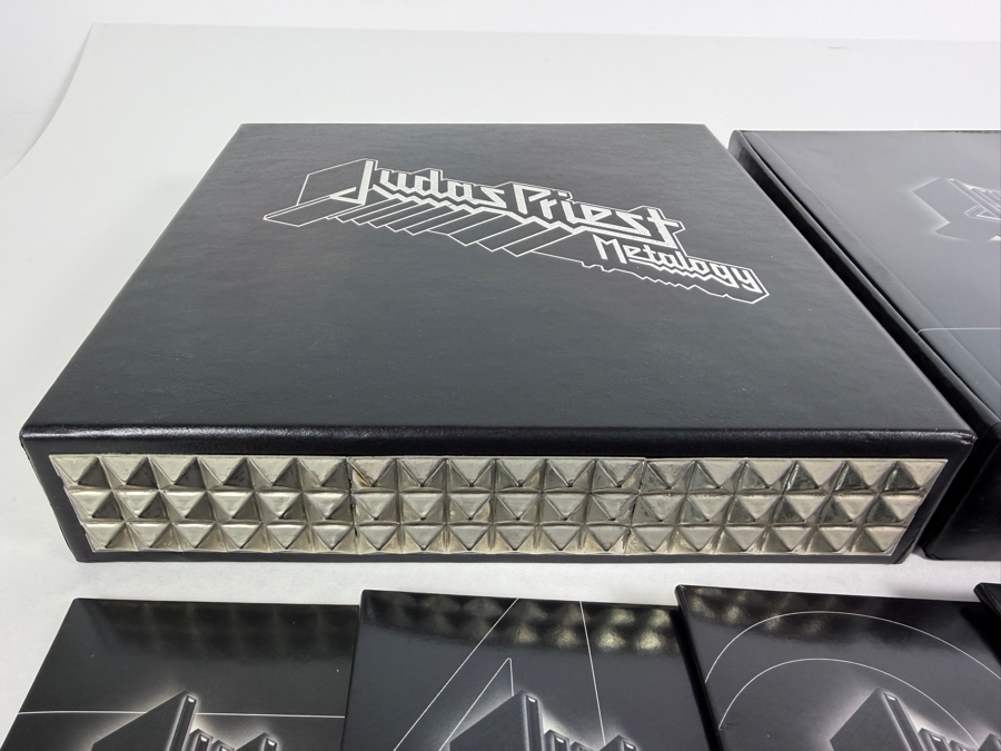 Judas Priest 'Metalogy' Limited Edition 5-Disc Box Set (4 CDs, 1 DVD, And 64-Page Retrospective Booklet) Featuring Black Faux-Leather Outer Slipcase Decorated With Triple-Row Pyramid Metal Stud Bound Edging [Photo 2]