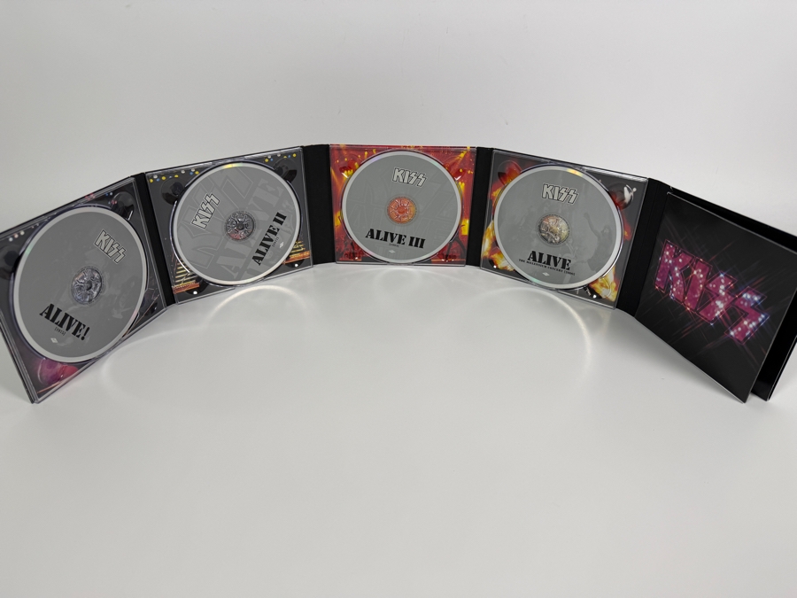 KISS 'Alive! 1975–2000' Remastered 4-CD Anthology Box Set Featuring A Road Case Graphic Outer Slipcase, 72-Page Collector's Booklet, And The Complete 'Millennium Concert' Audio Archive [Photo 3]