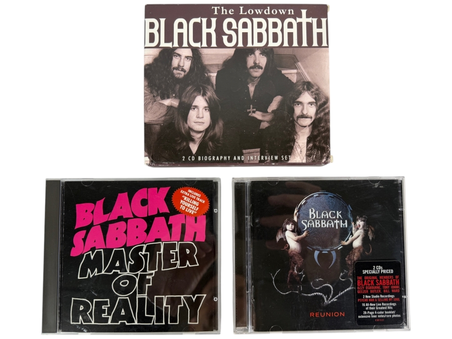 Black Sabbath Compact Disc Collection Lot Featuring 'The Lowdown' 2-CD Biography/Interview Box Set, 'Master of Reality' Expanded Remaster, And 'Reunion' Deluxe 2-CD Live Album
