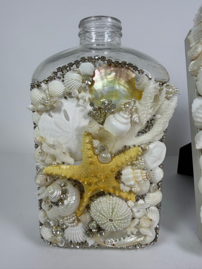 Handcrafted Coastal Elegance Mixed Shell Tabletop Set Featuring an Encrusted Decorative Glass Liquor Bottle and Coordinating White Shell Photo Frame 10'H and 12'H [Photo 3]