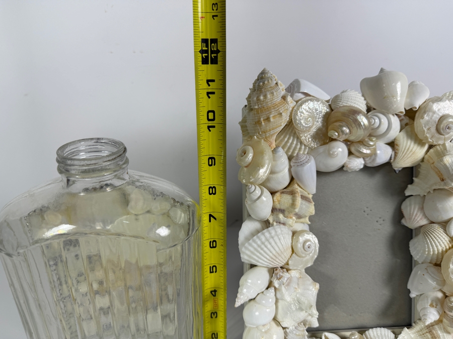 Handcrafted Coastal Elegance Mixed Shell Tabletop Set Featuring an Encrusted Decorative Glass Liquor Bottle and Coordinating White Shell Photo Frame 10'H and 12'H [Photo 6]