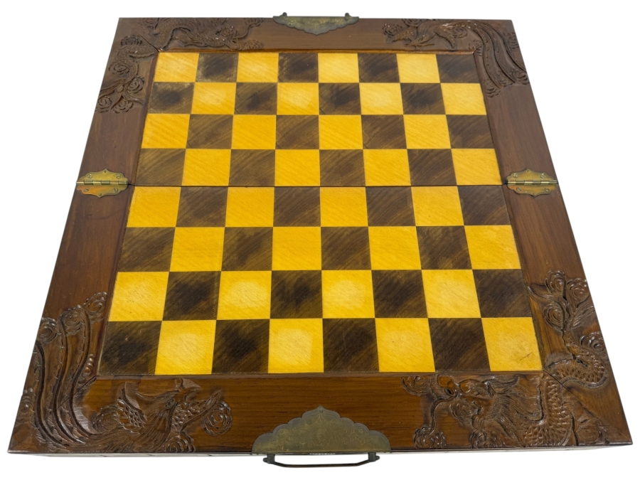 Vintage Mid Century Chinese Carved Wood Folding Chess Set Box Featuring Dragon Motifs And Red Velvet Lined Built In Drawer Compartments Storing Hand Carved Chess Pieces