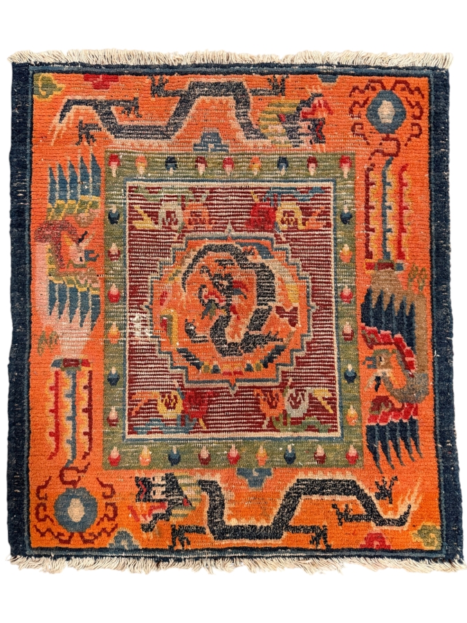 Antique Tibetan Handwoven Seat Mat Rug Featuring a Striking Orange Field with Dragon Motifs 22 X 26