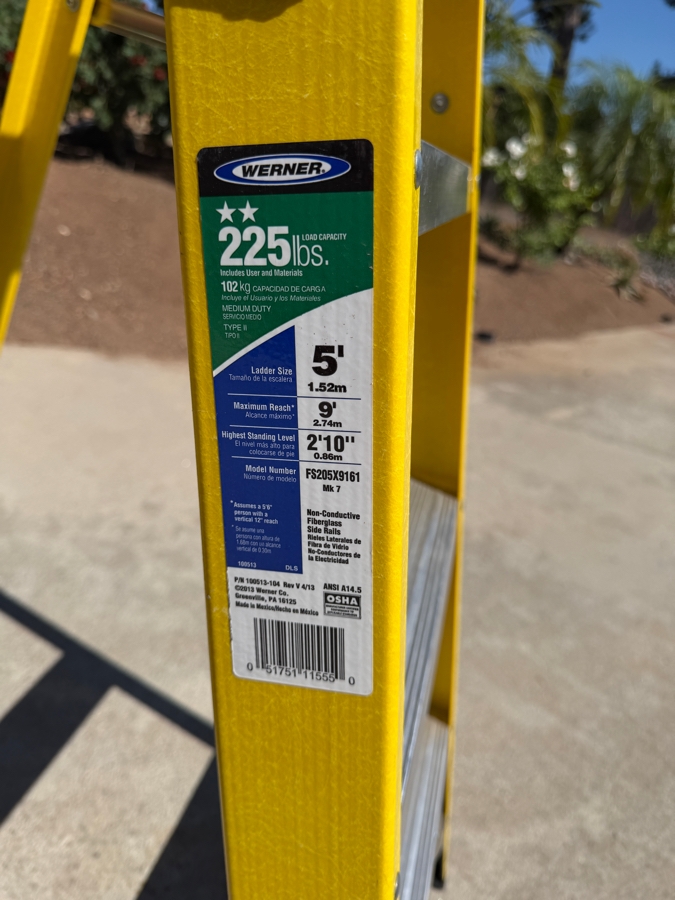 Werner Five Foot Yellow Fiberglass Type Two Medium Duty Stepladder Featuring Two Hundred Twenty Five Pound Load Capacity And Aluminum Steps [Photo 3]