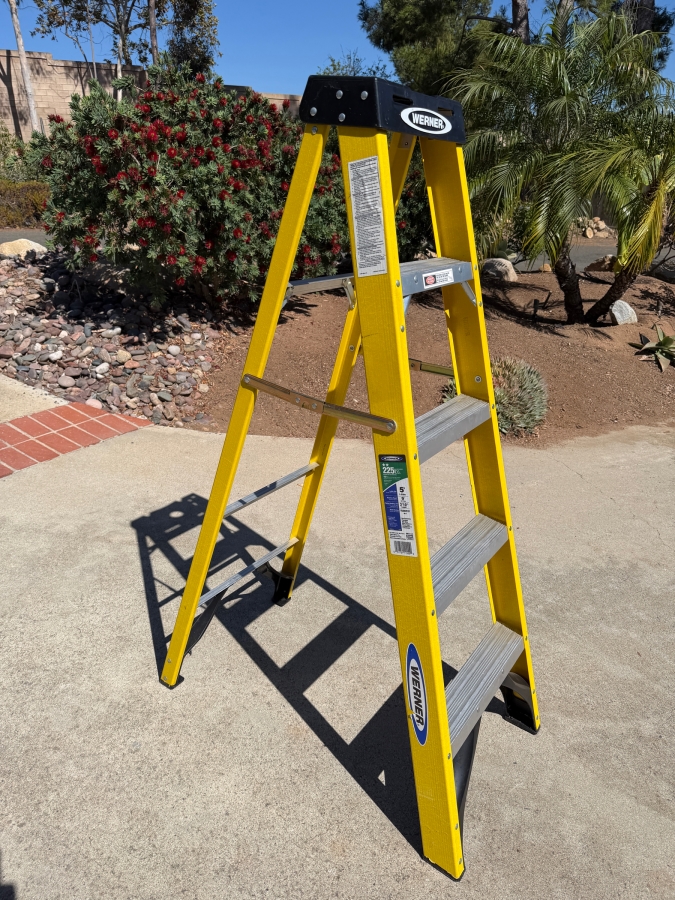 Werner Five Foot Yellow Fiberglass Type Two Medium Duty Stepladder Featuring Two Hundred Twenty Five Pound Load Capacity And Aluminum Steps
