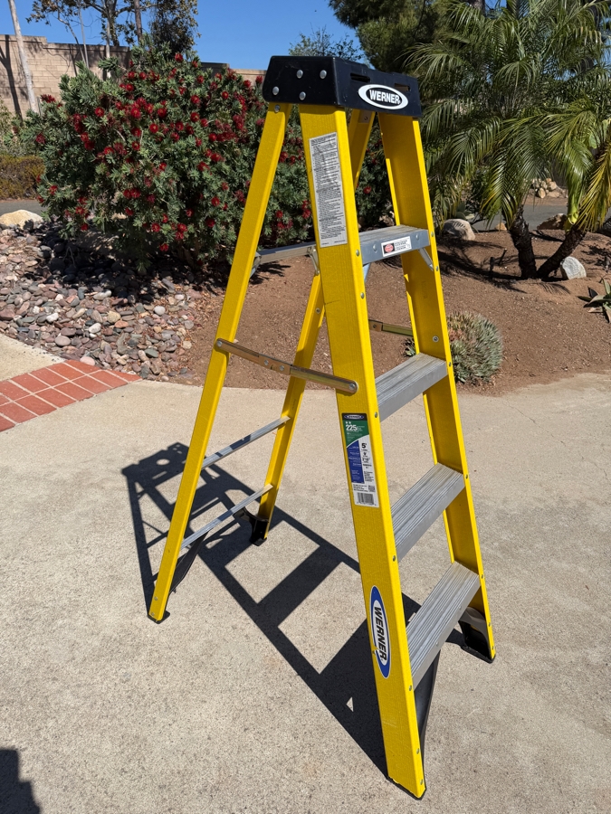 Werner Five Foot Yellow Fiberglass Type Two Medium Duty Stepladder Featuring Two Hundred Twenty Five Pound Load Capacity And Aluminum Steps [Photo 2]