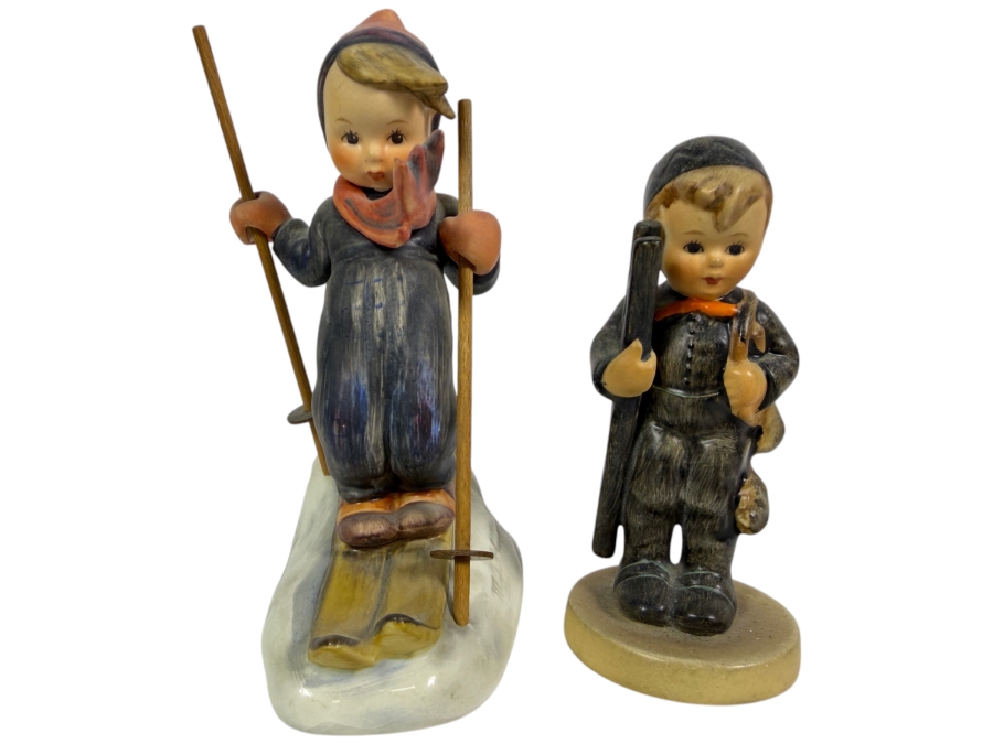 Two Vintage Goebel Hummel Porzellan German Figurine Sculptures Featuring Little Skier Number Fifty Nine And Skier Boy Running Home 4' - 5'H