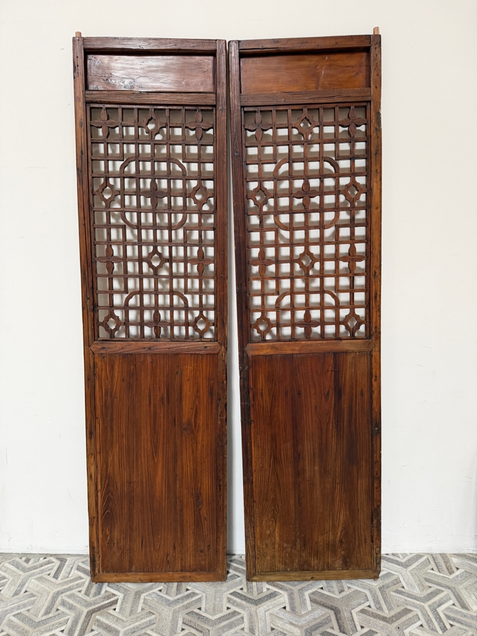 Pair of Antique Chinese Carved Elm Lattice Screens Featuring Intricate Fretwork and Figural Motifs Each Measures 25.5'W X 97'H [Photo 17]