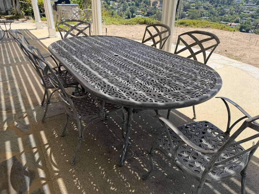 Bonaparte Cast Aluminum Oval Patio Dining Table And Six Cross-Back Armchairs With Cushions (See Photos for Cushions Not Shown in Main Photo) 84'W X 43'D X 29'H Retailed for $3,400 [Photo 8]