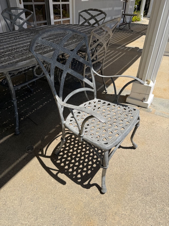 Bonaparte Cast Aluminum Oval Patio Dining Table And Six Cross-Back Armchairs With Cushions (See Photos for Cushions Not Shown in Main Photo) 84'W X 43'D X 29'H Retailed for $3,400 [Photo 12]