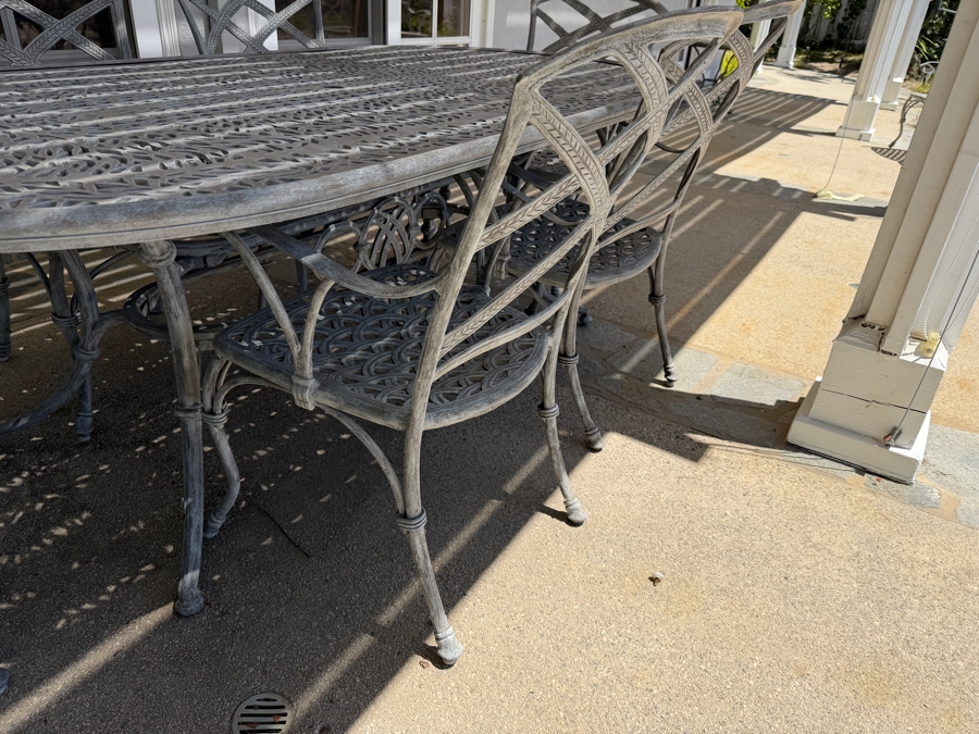 Bonaparte Cast Aluminum Oval Patio Dining Table And Six Cross-Back Armchairs With Cushions (See Photos for Cushions Not Shown in Main Photo) 84'W X 43'D X 29'H Retailed for $3,400 [Photo 5]