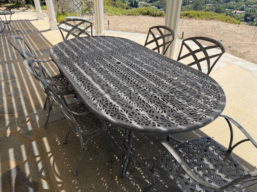 Bonaparte Cast Aluminum Oval Patio Dining Table And Six Cross-Back Armchairs With Cushions (See Photos for Cushions Not Shown in Main Photo) 84'W X 43'D X 29'H Retailed for $3,400 [Photo 9]