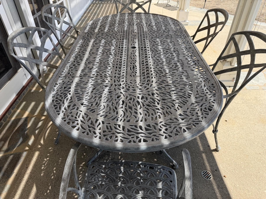 Bonaparte Cast Aluminum Oval Patio Dining Table And Six Cross-Back Armchairs With Cushions (See Photos for Cushions Not Shown in Main Photo) 84'W X 43'D X 29'H Retailed for $3,400 [Photo 7]