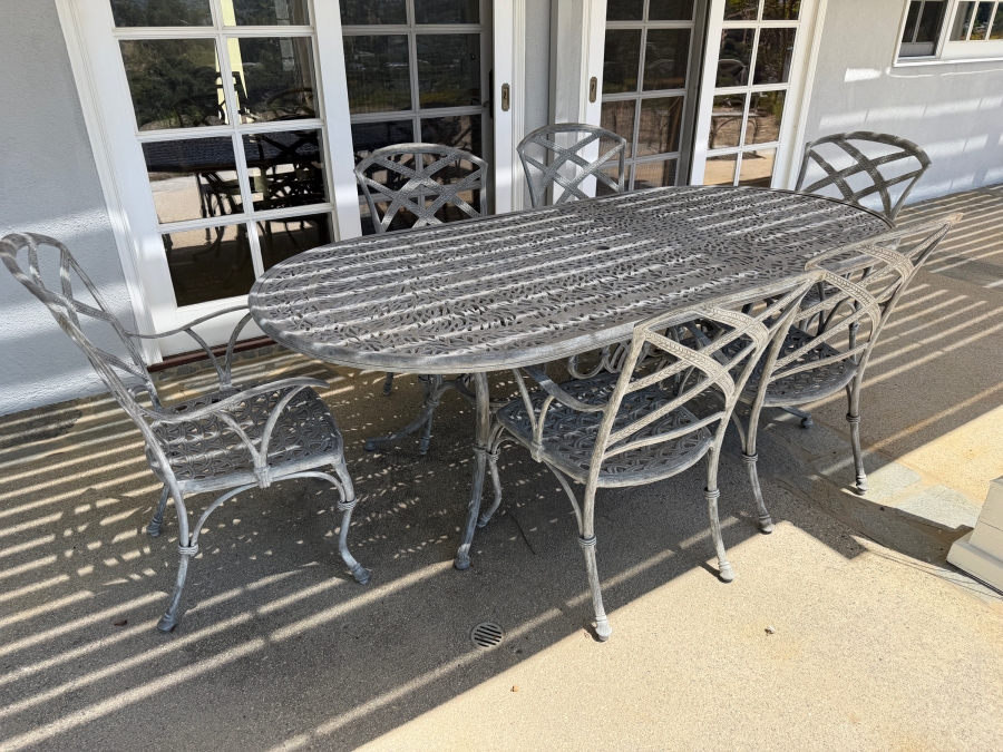 Bonaparte Cast Aluminum Oval Patio Dining Table And Six Cross-Back Armchairs With Cushions (See Photos for Cushions Not Shown in Main Photo) 84'W X 43'D X 29'H Retailed for $3,400