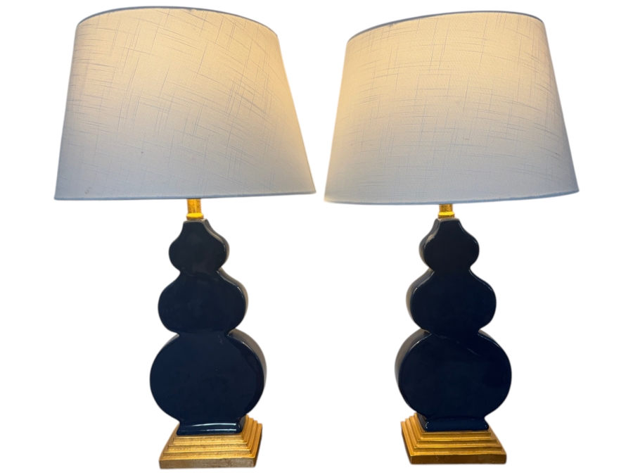 Pair Of JONATHAN Y Carter 29 Inch Navy Blue Flat Double Sided Triple Gourd Ceramic Table Lamps With Gold Leaf Bases And White Linen Shades