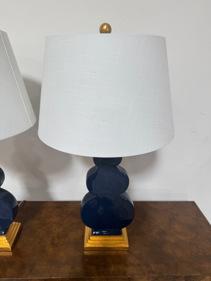 Pair Of JONATHAN Y Carter 29 Inch Navy Blue Flat Double Sided Triple Gourd Ceramic Table Lamps With Gold Leaf Bases And White Linen Shades [Photo 4]