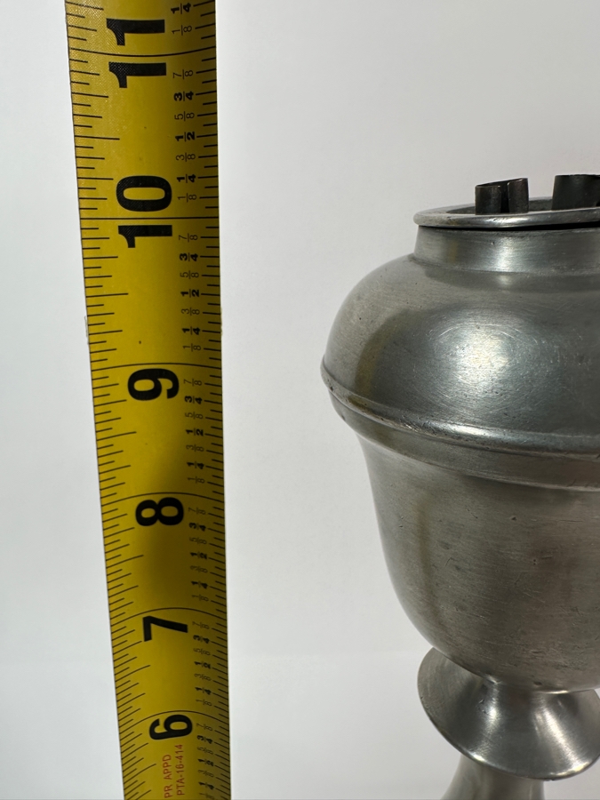 Homans & Co Type Whale Oil Lamp	American, Cincinnati, Ohio Circa 19th Century with Urn-Shaped Upper Portion above a Pear Shaped Stem on a Splayed Foot (the Shade is Missing) 10'H Appraised Value of $1,000 [Photo 5]