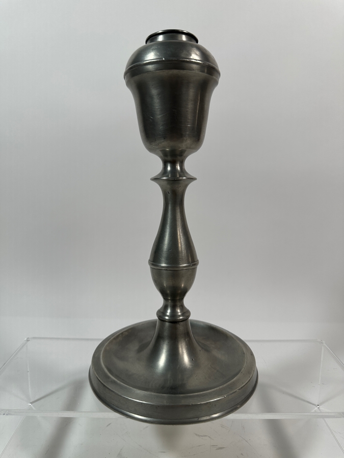 Homans & Co Type Whale Oil Lamp	American, Cincinnati, Ohio Circa 19th Century with Urn-Shaped Upper Portion above a Pear Shaped Stem on a Splayed Foot (the Shade is Missing) 10'H Appraised Value of $1,000 [Photo 4]