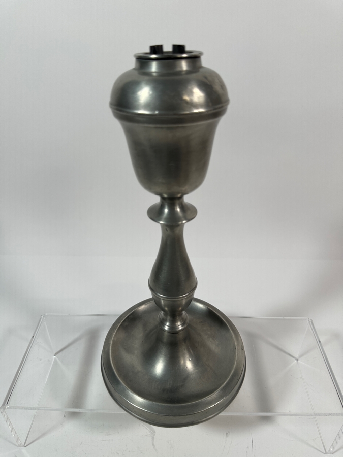 Homans & Co Type Whale Oil Lamp	American, Cincinnati, Ohio Circa 19th Century with Urn-Shaped Upper Portion above a Pear Shaped Stem on a Splayed Foot (the Shade is Missing) 10'H Appraised Value of $1,000 [Photo 3]