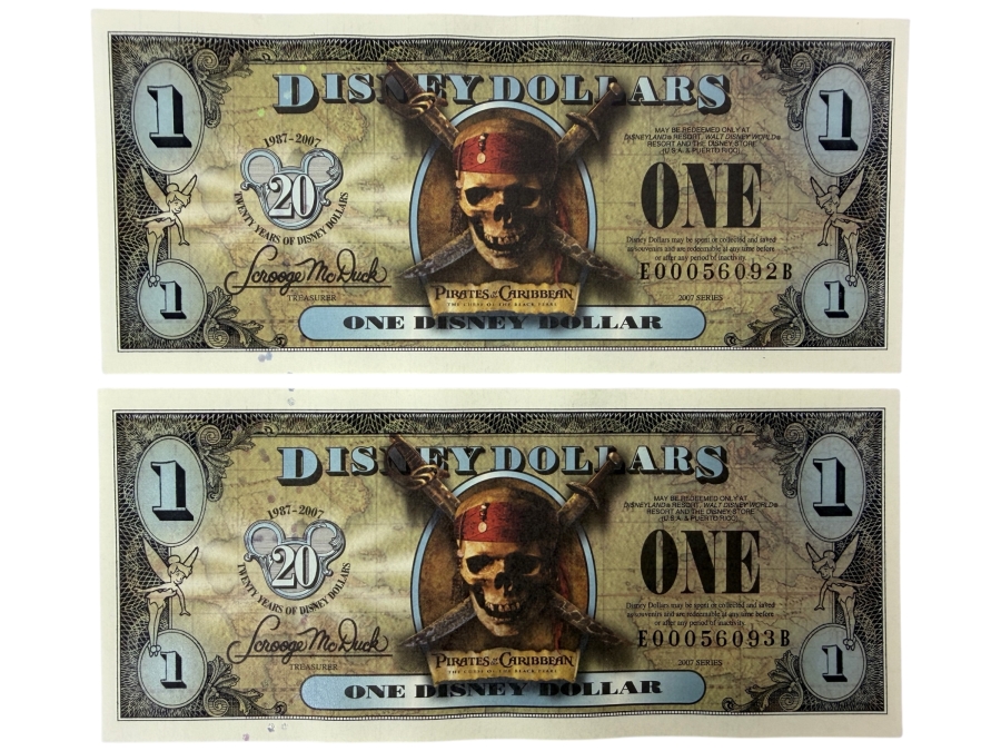 (2) 2007 Series $1 Disney Dollars Pirates of the Caribbean: The Curse of the Black Pearl Design In Mint Uncirculated Condition Consecutive Serial Numbers E00056092B / E00056093B