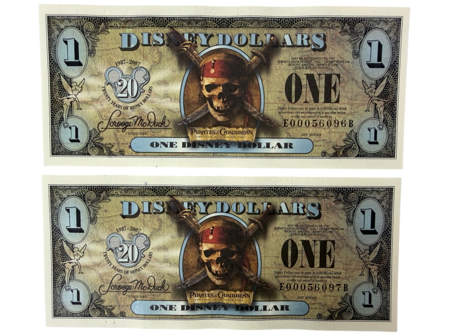 (2) 2007 Series $1 Disney Dollars Pirates of the Caribbean: The Curse of the Black Pearl Design In Mint Uncirculated Condition Consecutive Serial Numbers E00056096B / E00056097B