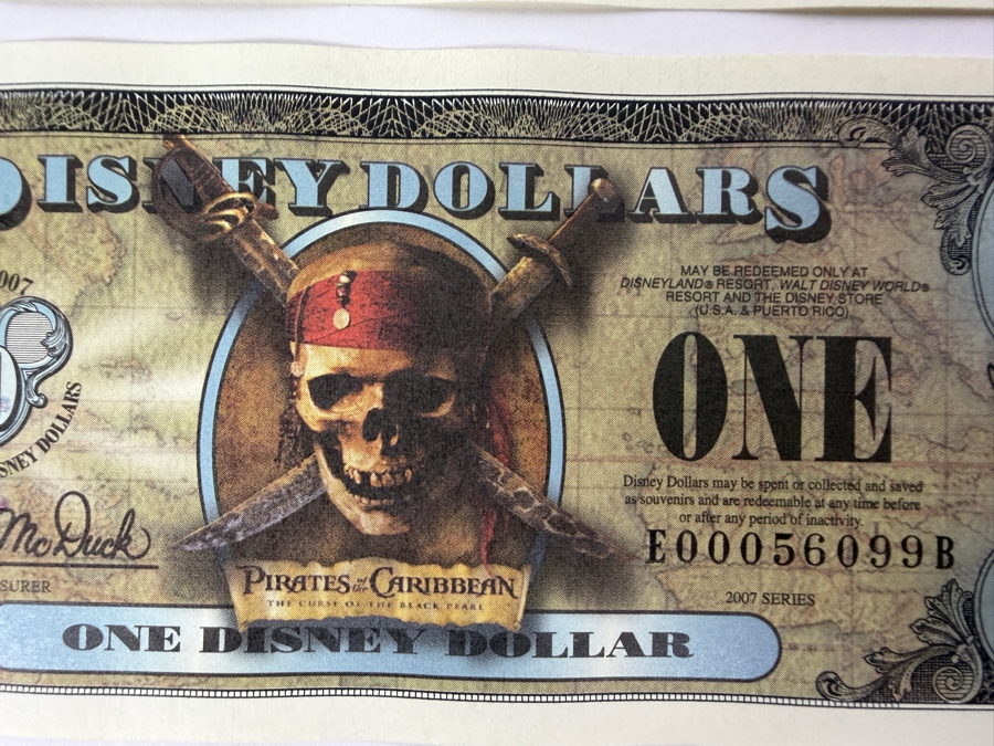 (2) 2007 Series $1 Disney Dollars Pirates of the Caribbean: The Curse of the Black Pearl Design In Mint Uncirculated Condition Consecutive Serial Numbers E00056098B / E00056099B [Photo 3]