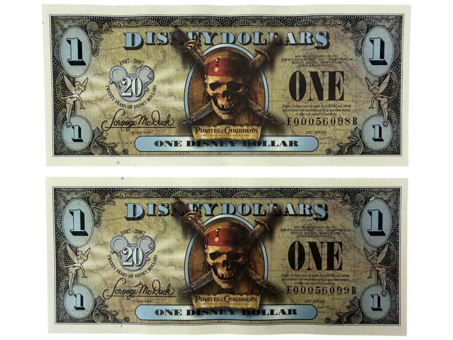 (2) 2007 Series $1 Disney Dollars Pirates of the Caribbean: The Curse of the Black Pearl Design In Mint Uncirculated Condition Consecutive Serial Numbers E00056098B / E00056099B