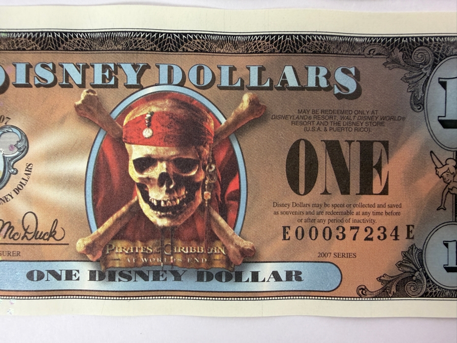 (2) 2007 Series $1 Disney Dollars Pirates of the Caribbean: At World's End Skull Design In Mint Uncirculated Condition Consecutive Serial Numbers E00037233E / E00037234E [Photo 3]