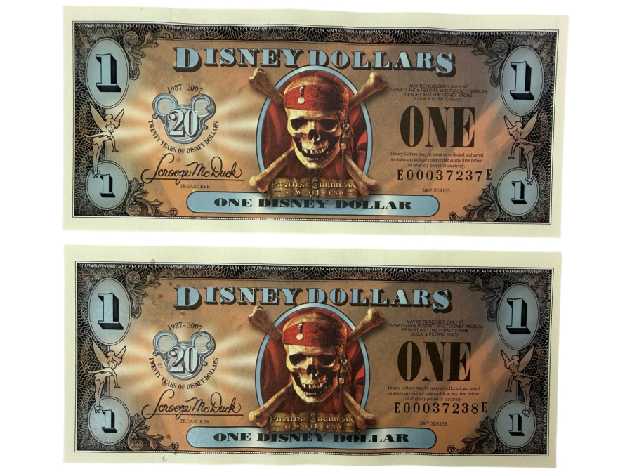 (2) 2007 Series $1 Disney Dollars Pirates of the Caribbean: At World's End Skull Design In Mint Uncirculated Condition Consecutive Serial Numbers E00037237E / E00037238E