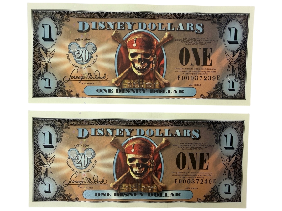(2) 2007 Series $1 Disney Dollars Pirates of the Caribbean: At World's End Skull Design In Mint Uncirculated Condition Consecutive Serial Numbers E00037239E / E00037240E