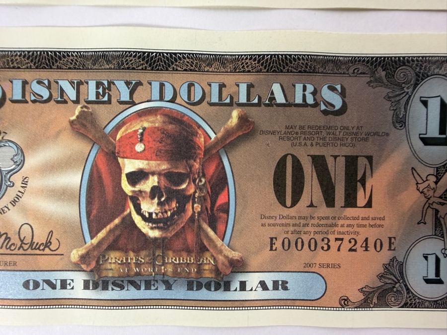 (2) 2007 Series $1 Disney Dollars Pirates of the Caribbean: At World's End Skull Design In Mint Uncirculated Condition Consecutive Serial Numbers E00037239E / E00037240E [Photo 3]