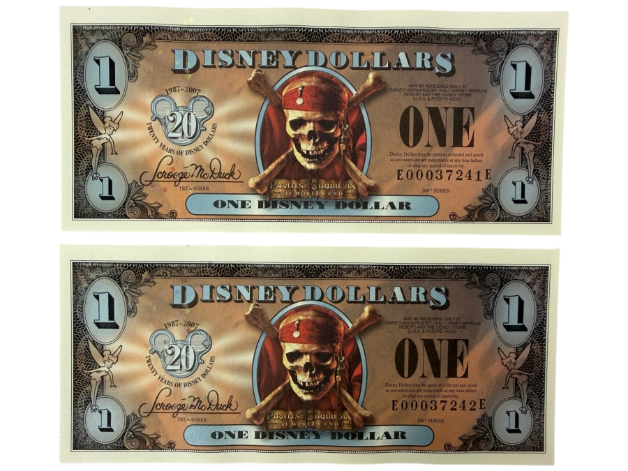 (2) 2007 Series $1 Disney Dollars Pirates of the Caribbean: At World's End Skull Design In Mint Uncirculated Condition Consecutive Serial Numbers E00037241E / E00037242E