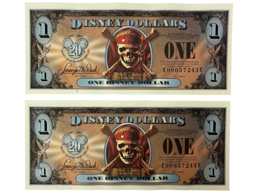 (2) 2007 Series $1 Disney Dollars Pirates of the Caribbean: At World's End Skull Design In Mint Uncirculated Condition Consecutive Serial Numbers E00037243E / E00037244E